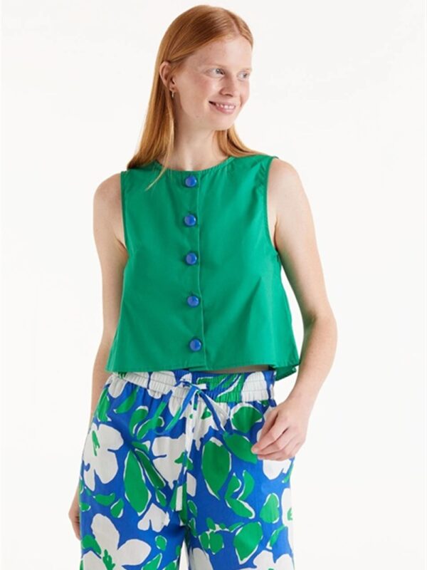 <p>
  Top con bottoni a contrasto
</p>Compania Fantastica