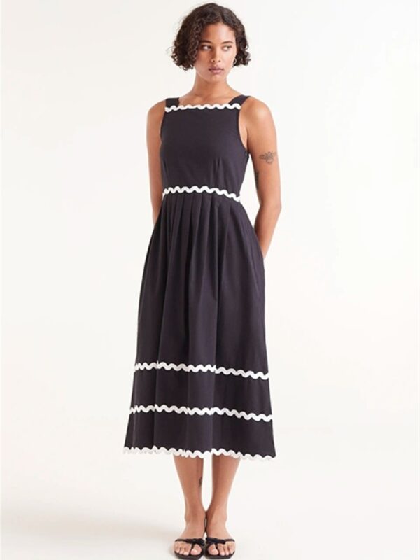 <p>
  Abito midi con profili a contrasto
</p>Compania Fantastica
