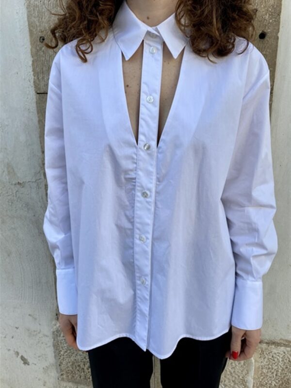 <p>
  Camicia in popeline con apertura sul davanti bianca
</p>Mariuccia Milano