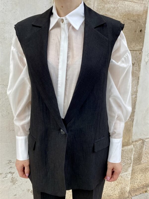 <p>
  Gilet in misto lino nero
</p>Dixie