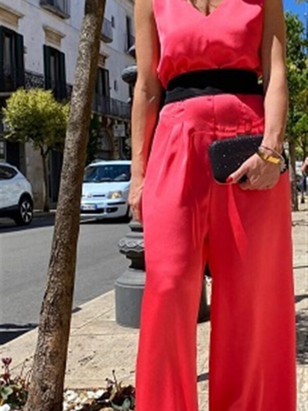 <p>
  Tuta con cintura e fiocco
</p>Tolérance Couture