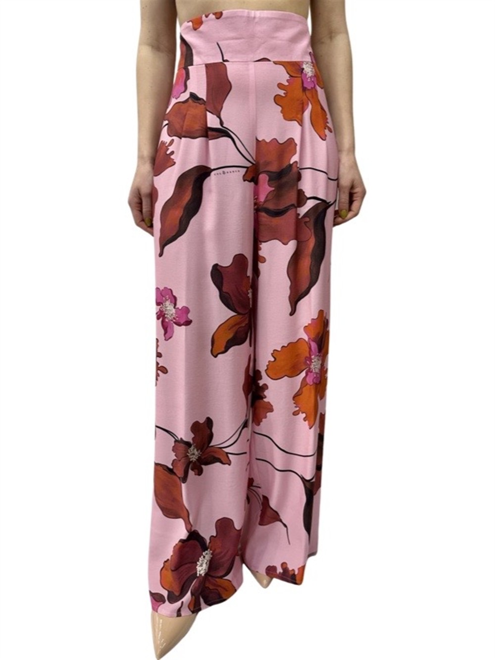 <p>
  Pantalone palazzo a fantasia con elastico in vita
</p>Tolérance