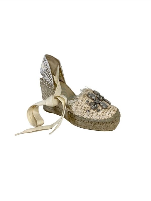 <p>
  Espadrillas a punta quadra con pietre 
</p>Vidorreta