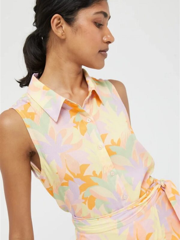 <p>
  Camicia smanicata a fantasia
</p>Compania Fantastica