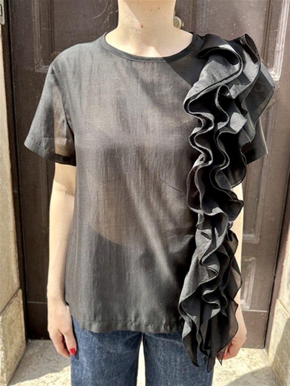 <p>
  Blusa a mezza manica con rouches laterali nera
</p>H2o