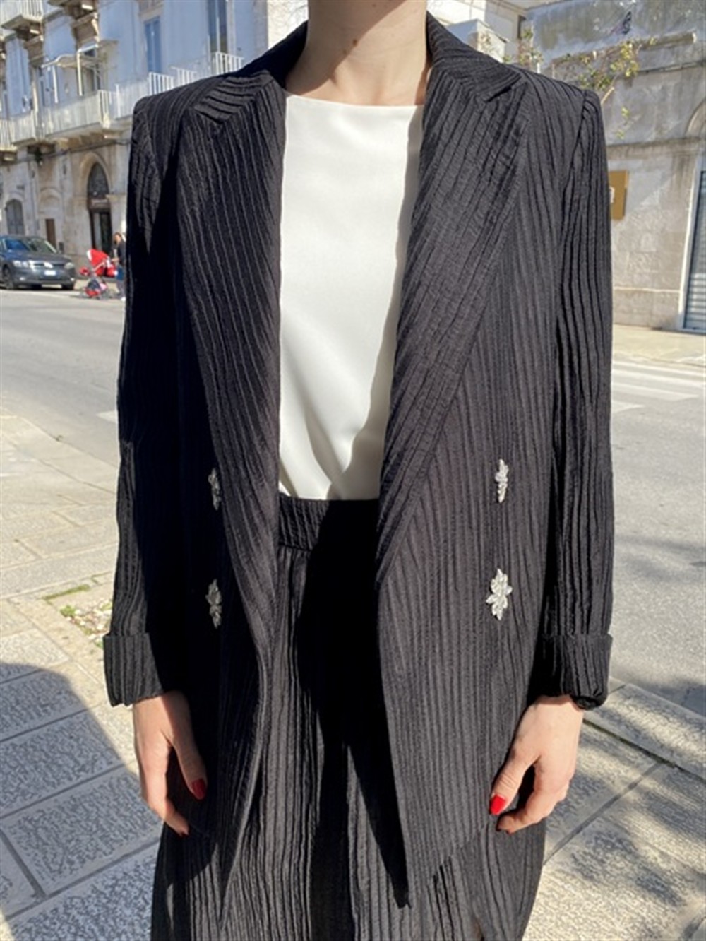 <p>
  Giacca in tessuto rigato con applicazioni
</p>Tolérance Couture