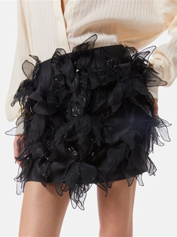 <p>
  Minigonna con applicazioni 
</p>Silvian Heach