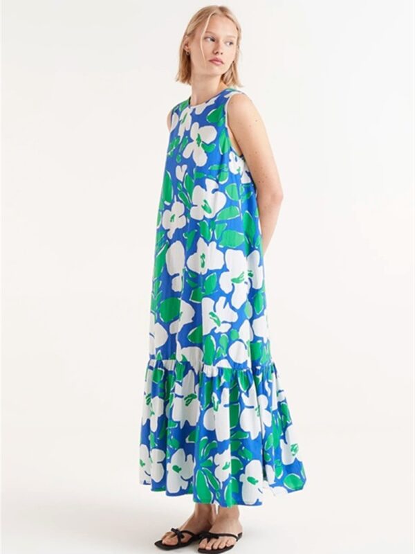 <p>
  Abito lungo a fantasia floreale con balza sul fondo 
</p>Compania Fantastica