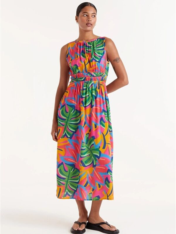 <p>
  Abito lungo a fantasia con elastico in vita
</p>Compania Fantastica