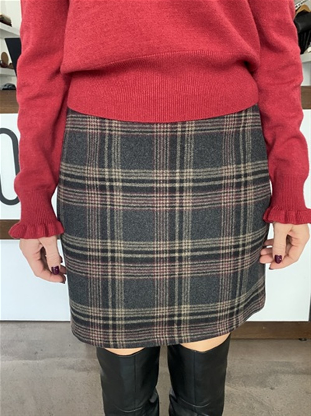 <p>
  Minigonna a quadri
</p>Dixie