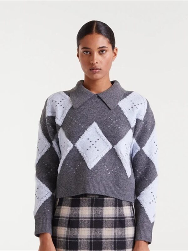 <p>
  Maglioncino a rombi con colletto GRIGIO
</p>Compania Fantastica