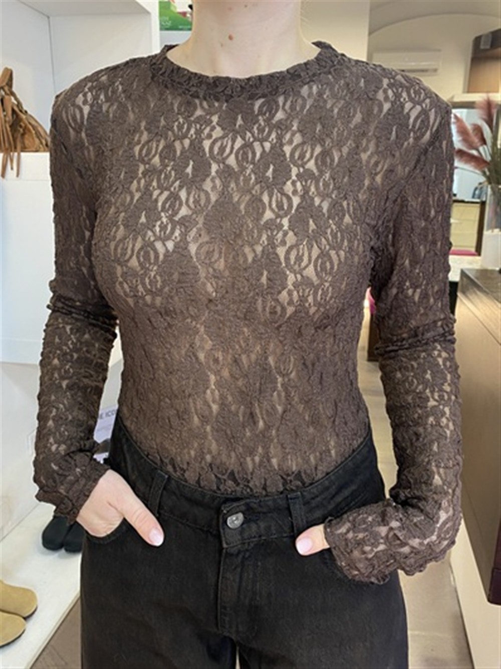 <p>
  Body in pizzo a manica lunga
</p>Dixie