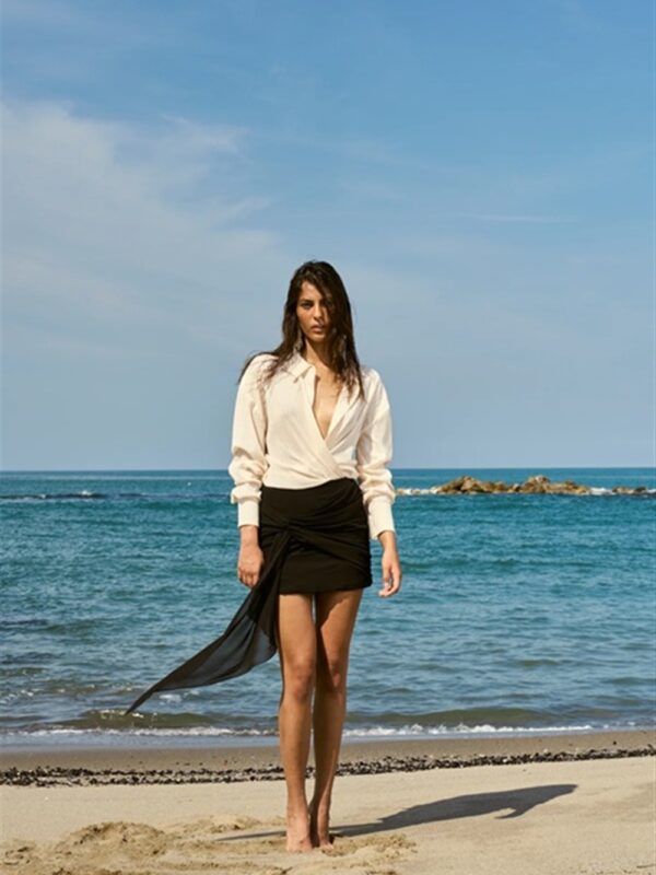 <p>
  Minigonna con fascia pendente
</p>Silvian Heach