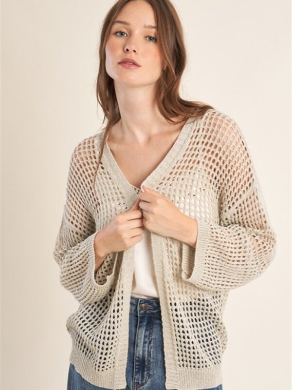 <p>
  Cardigan traforato iridescente
</p>Molly Bracken