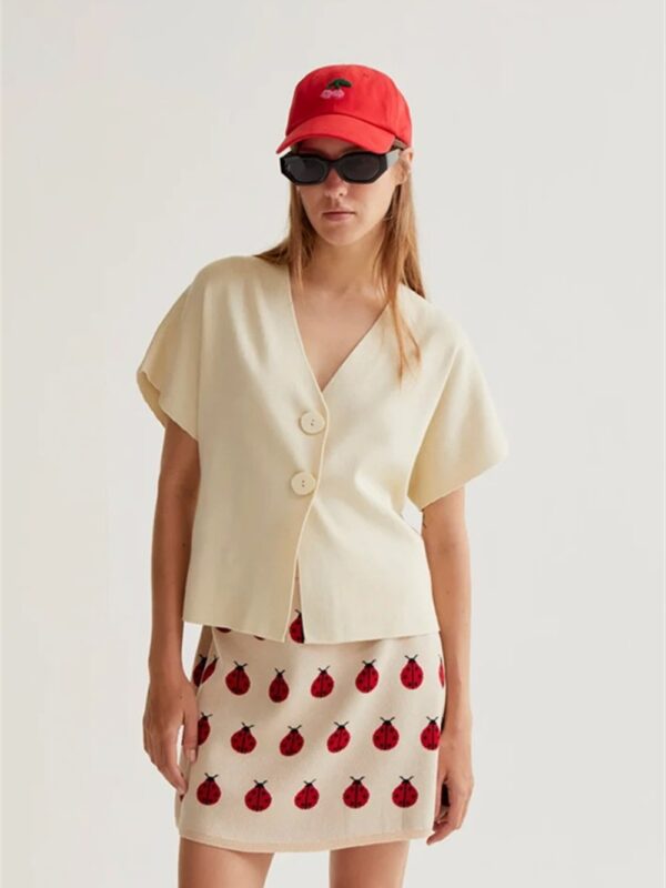 <p>
Cardigan in maglia a mezza manica
</p>Compania Fantastica
