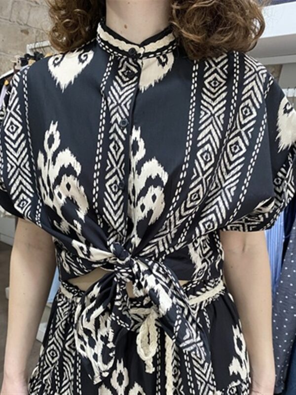 <p>
Camicia stampa etnica
</p>Dixie