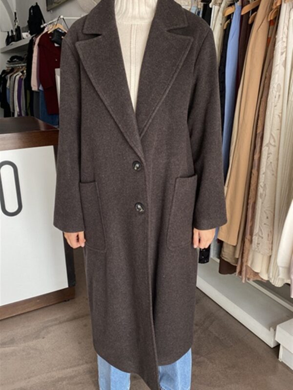 <p>
  Cappotto lungo monopetto misto lana con tasconi applicati
</p>Happy 25